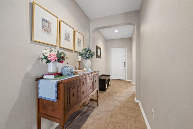 901 Water Hyacinth Loop, Leander, TX 78641 - hall with arched walkways, light tile patterned flooring, and recessed lighting