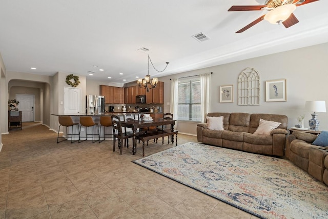 901 Water Hyacinth Loop, Leander, TX 78641 - living area featuring a chandelier, arched walkways, a ceiling fan, and recessed lighting