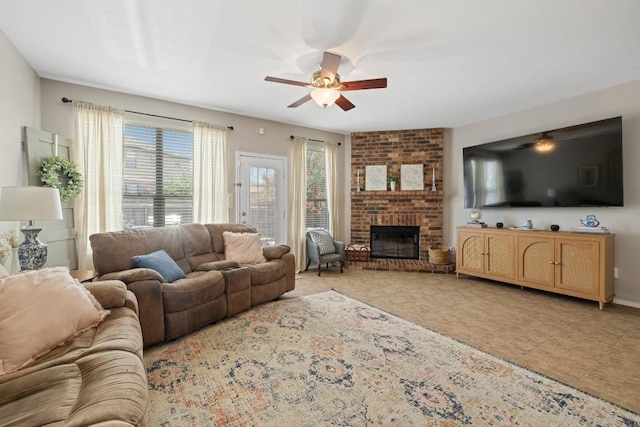 901 Water Hyacinth Loop, Leander, TX 78641 - living room with a ceiling fan, a brick fireplace, and tile patterned flooring