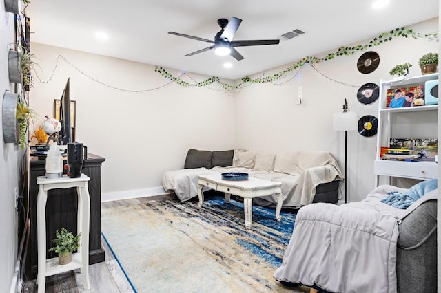 633 N Stovall Dr, Robinson, TX 76706 - living room featuring a ceiling fan, wood finished floors, and recessed lighting