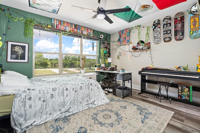 633 N Stovall Dr, Robinson, TX 76706 - bedroom featuring baseboards and wood finished floors
