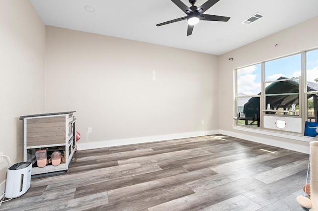 633 N Stovall Dr, Robinson, TX 76706 - empty room featuring a ceiling fan and wood finished floors