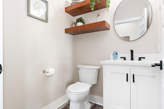 633 N Stovall Dr, Robinson, TX 76706 - half bath with vanity and wood finished floors