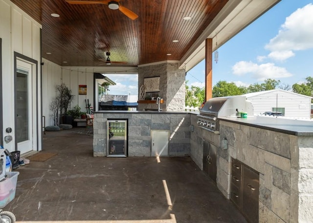 633 N Stovall Dr, Robinson, TX 76706 - view of patio featuring wine cooler, exterior kitchen, and a ceiling fan