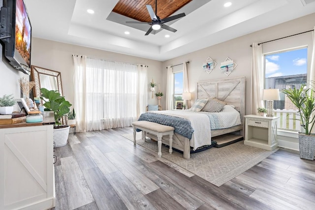 633 N Stovall Dr, Robinson, TX 76706 - bedroom with a raised ceiling, light wood-style flooring, recessed lighting, wooden ceiling, and ceiling fan