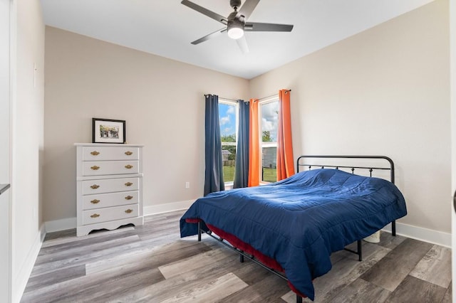 633 N Stovall Dr, Robinson, TX 76706 - bedroom with wood finished floors and a ceiling fan