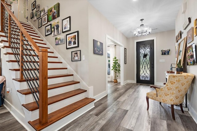 633 N Stovall Dr, Robinson, TX 76706 - foyer with wood finished floors, a chandelier, and stairway