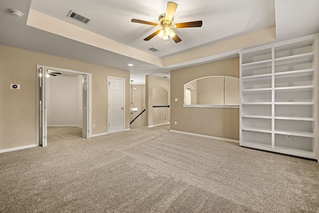 2604 Zambia Dr, Cedar Park, TX 78613 - unfurnished bedroom with carpet flooring, a raised ceiling, and a ceiling fan