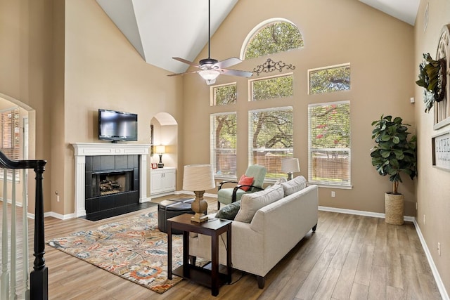 2604 Zambia Dr, Cedar Park, TX 78613 - living area featuring arched walkways, high vaulted ceiling, a ceiling fan, and plenty of natural light