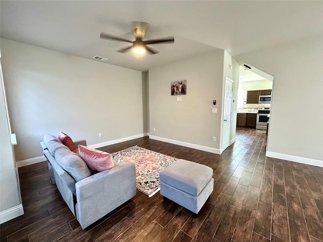3805 E US-290 Hwy E, Paige, TX 78659 - living room with dark wood finished floors and ceiling fan