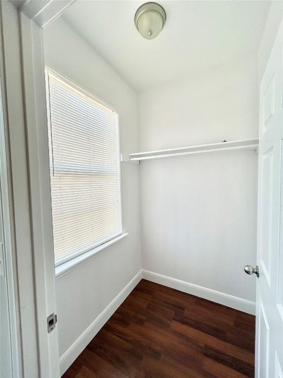 3805 E US-290 Hwy E, Paige, TX 78659 - walk in closet with dark wood-style floors