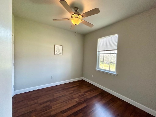 3805 E US-290 Hwy E, Paige, TX 78659 - spare room with dark wood-style flooring and a ceiling fan