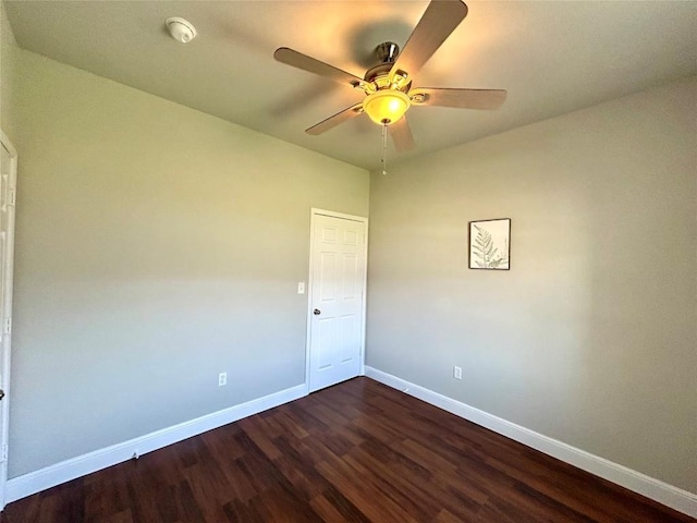 3805 E US-290 Hwy E, Paige, TX 78659 - spare room featuring dark wood-style floors, ceiling fan, and a smoke detector