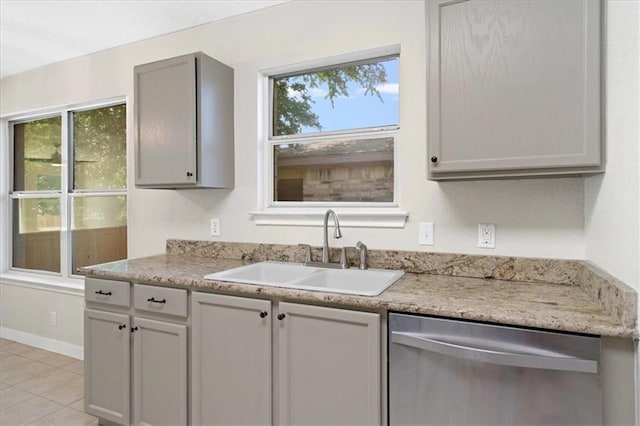 1804 Fairweather Way, Cedar Park, TX 78613 - kitchen with stainless steel dishwasher, healthy amount of natural light, and light tile patterned floors