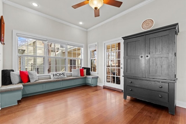 1295 Berry L Ln, Georgetown, TX 78626 - living area featuring a ceiling fan, wood finished floors, ornamental molding, and recessed lighting