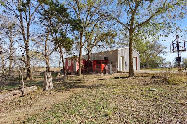1295 Berry L Ln, Georgetown, TX 78626 - view of yard with an outdoor structure and a pole building