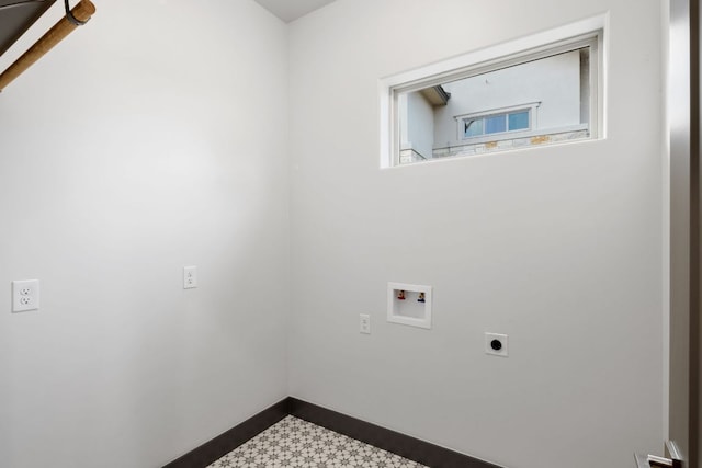 311 Out Crop, Horseshoe Bay, TX 78657 - washroom with hookup for an electric dryer, washer hookup, and dark flooring