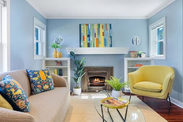 4419 Sinclair Ave, Austin, TX 78756 - living room featuring wood finished floors, crown molding, and a lit fireplace