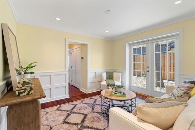 4419 Sinclair Ave, Austin, TX 78756 - living area featuring wood finished floors, crown molding, a wainscoted wall, french doors, and recessed lighting
