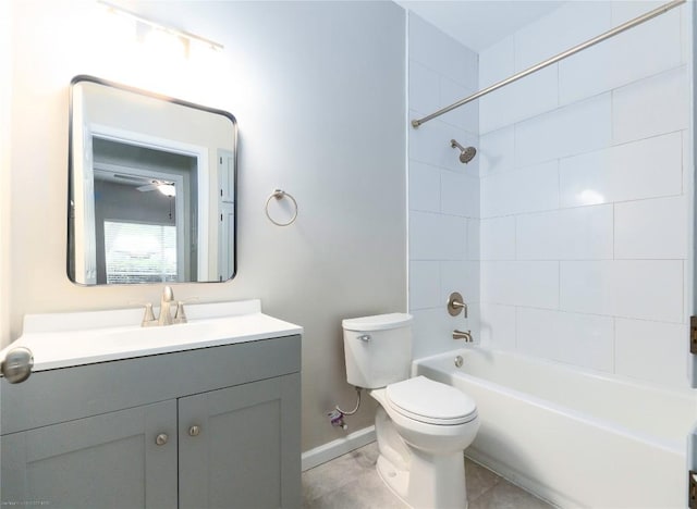 2450 Wickersham Ln Unit 1001, Austin, TX 78741 - full bathroom featuring vanity, washtub / shower combination, tile patterned flooring, and a ceiling fan