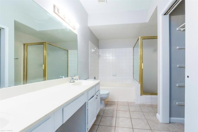 2450 Wickersham Ln Unit 1001, Austin, TX 78741 - bathroom with double vanity, a shower with door, a bathtub, and tile patterned flooring