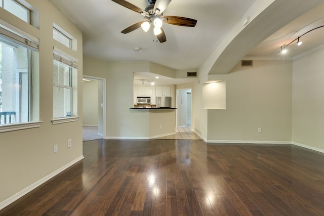 9525 N Capital Of Texas Hwy Unit 414, Austin, TX 78759 - unfurnished living room with a ceiling fan and wood-type flooring
