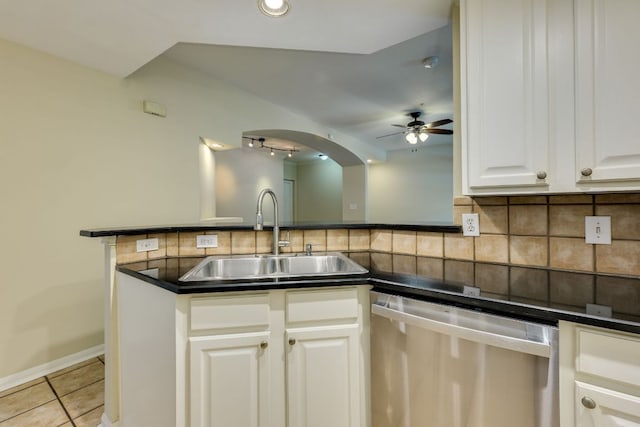 9525 N Capital Of Texas Hwy Unit 414, Austin, TX 78759 - kitchen with dishwasher, light tile patterned floors, tasteful backsplash, ceiling fan, and dark countertops