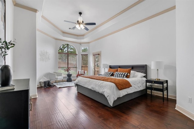 7608 Journeyville Dr, Austin, TX 78735 - bedroom with crown molding, a tray ceiling, dark wood finished floors, and ceiling fan