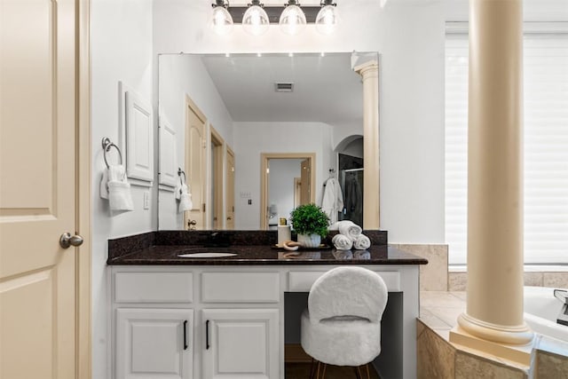 7608 Journeyville Dr, Austin, TX 78735 - full bath with vanity and a garden tub