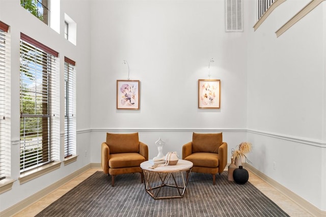 7608 Journeyville Dr, Austin, TX 78735 - sitting room with a high ceiling and baseboards
