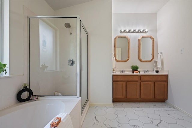 1917 Golden Sunrise Ln, Pflugerville, TX 78660 - bathroom featuring a shower stall, a garden tub, double vanity, and tile patterned floors