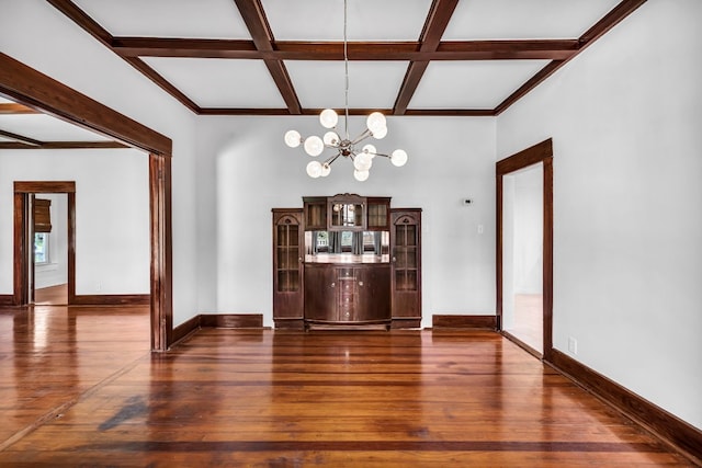 1806 S Main St, Georgetown, TX 78626 - unfurnished dining area featuring coffered ceiling, a chandelier, dark wood-style floors, and beamed ceiling