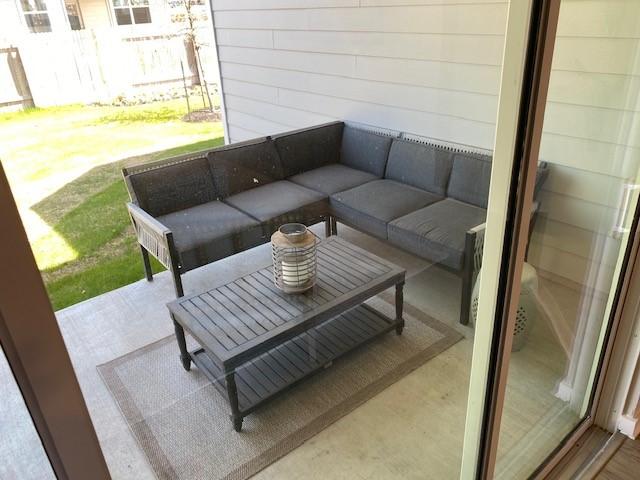303 Watercourse Way, Bastrop, TX 78602 - balcony featuring an outdoor living space