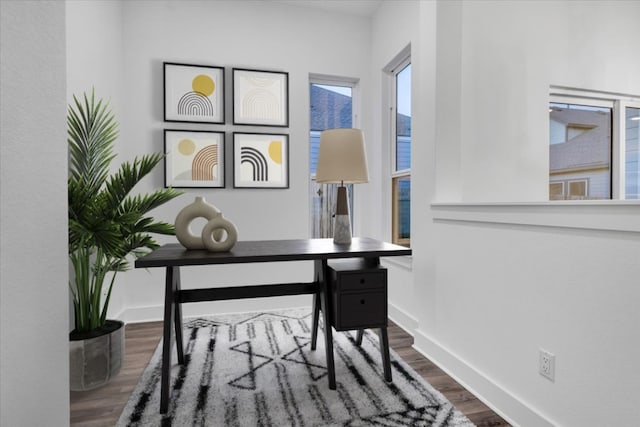 8609 San Giano Cv, Round Rock, TX 78665 - office featuring dark wood-type flooring and baseboards