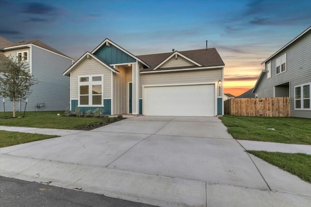 8609 San Giano Cv, Round Rock, TX 78665 - view of front of house featuring board and batten siding, a garage, and driveway
