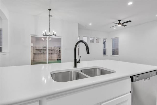 8609 San Giano Cv, Round Rock, TX 78665 - kitchen featuring stainless steel dishwasher, recessed lighting, light countertops, decorative light fixtures, and ceiling fan