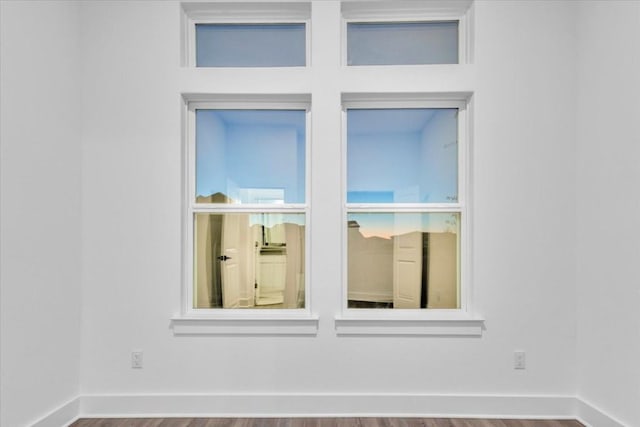8609 San Giano Cv, Round Rock, TX 78665 - detailed view of wood finished floors and baseboards