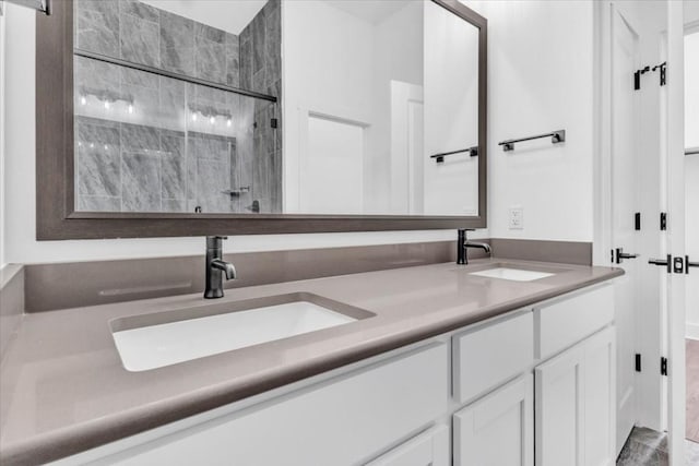8609 San Giano Cv, Round Rock, TX 78665 - full bathroom with a shower stall and double vanity