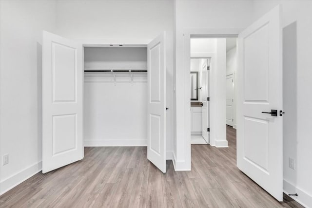 8609 San Giano Cv, Round Rock, TX 78665 - unfurnished bedroom with light wood-style flooring and a closet