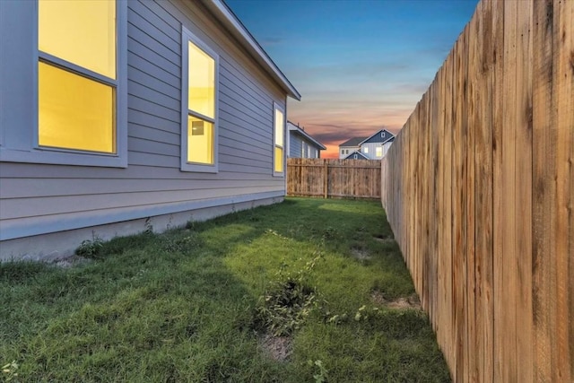8609 San Giano Cv, Round Rock, TX 78665 - property exterior at dusk with a fenced backyard