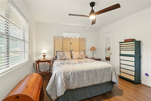 2415 W Fm 2147 W, Horseshoe Bay, TX 78657 - bedroom featuring wood finished floors and ceiling fan