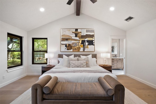 506 Explorer, Lakeway, TX 78734 - bedroom with light wood-style flooring, recessed lighting, ensuite bathroom, and a ceiling fan