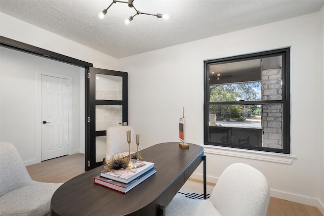 506 Explorer, Lakeway, TX 78734 - office space with wood finished floors and a textured ceiling