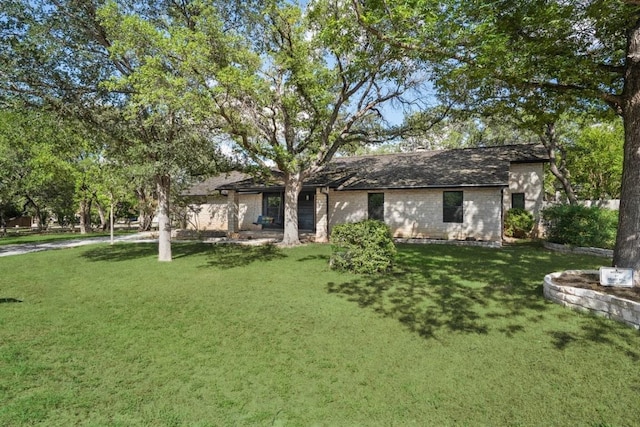 506 Explorer, Lakeway, TX 78734 - rear view of property featuring a yard