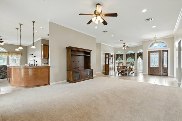 100 Davis Ct, Thorndale, TX 76577 - living room with ceiling fan, ornamental molding, recessed lighting, light carpet, and light tile patterned floors