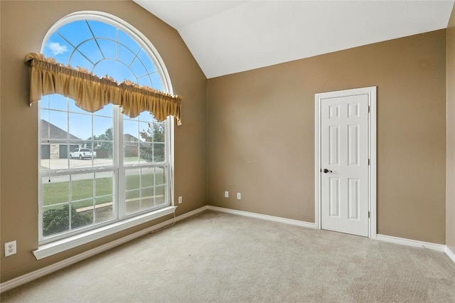 100 Davis Ct, Thorndale, TX 76577 - carpeted empty room with lofted ceiling and plenty of natural light