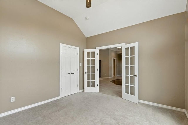 100 Davis Ct, Thorndale, TX 76577 - empty room with french doors, carpet floors, and high vaulted ceiling