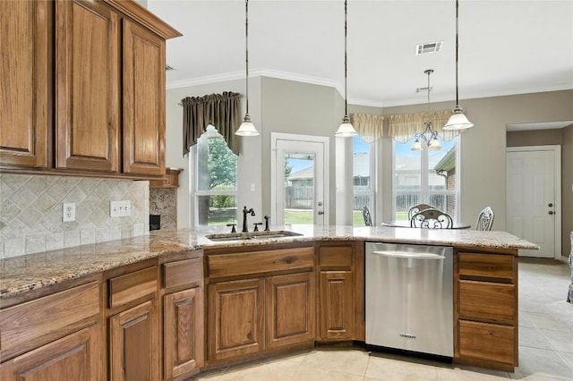 100 Davis Ct, Thorndale, TX 76577 - kitchen with stainless steel dishwasher, brown cabinetry, light stone countertops, decorative backsplash, and light tile patterned floors
