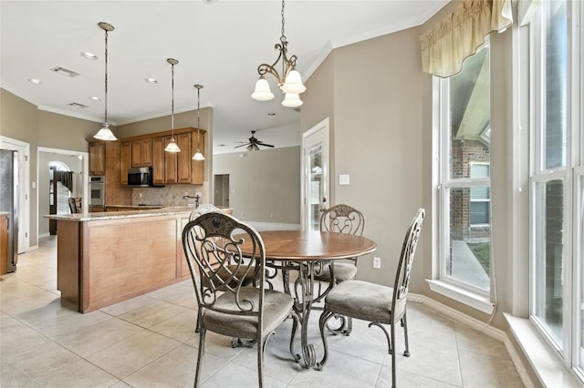 100 Davis Ct, Thorndale, TX 76577 - dining room with crown molding, light tile patterned flooring, ceiling fan, and recessed lighting