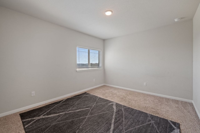 17418 Gabbro Dr, Pflugerville, TX 78660 - carpeted empty room with baseboards and a smoke detector